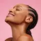 A photo of a woman with contouring makeup around her jawline