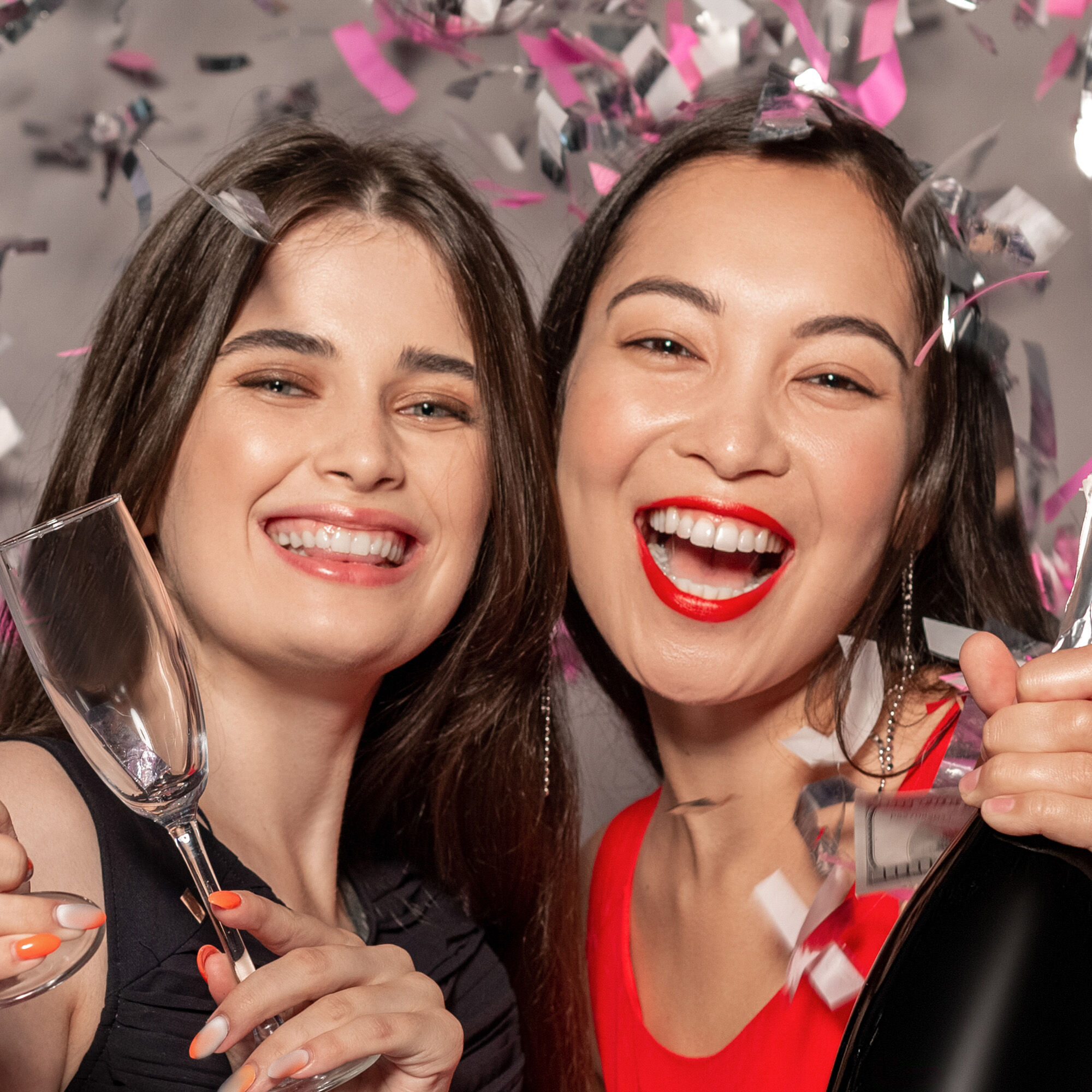 A photo of a women smiling at a party