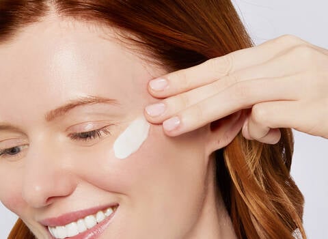 A photo of a woman with clear skin