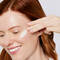 A photo of a woman with clear skin