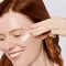 A photo of a woman with clear skin