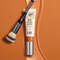 A product shot of IT Cosmetics CC+ Nude Glow Lightweight Foundation + Glow Serum with SPF 40