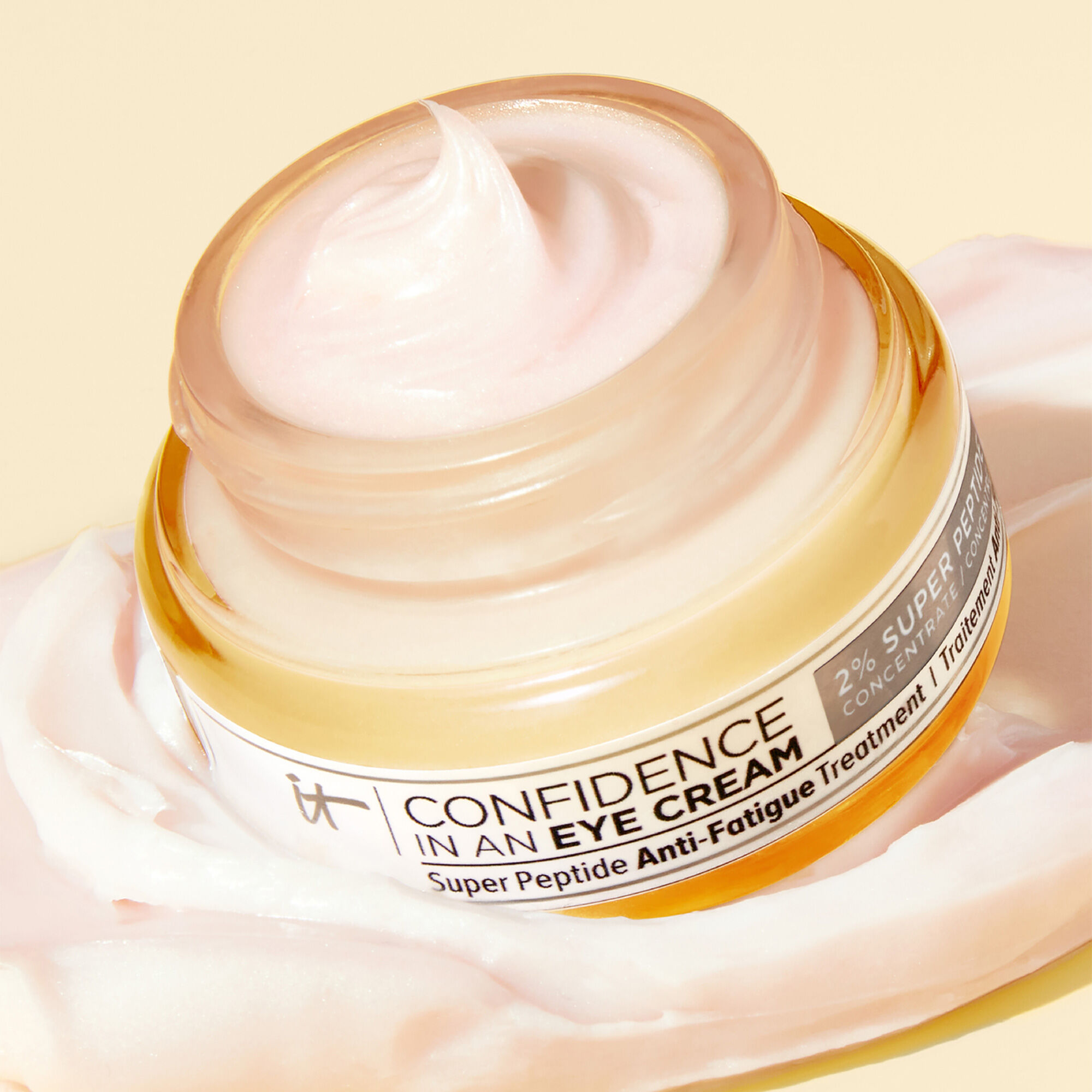 A photo of a woman holding Confidence in an Eye Cream 2% Super Peptide