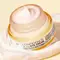 A photo of a woman holding Confidence in an Eye Cream 2% Super Peptide