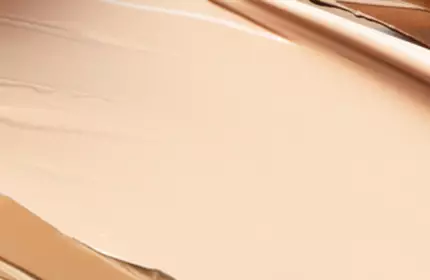 Banner image with pink background showing skincare product dropper