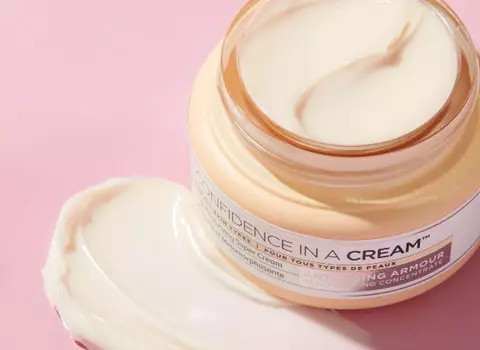 Jar of Face Cream with Pink Background