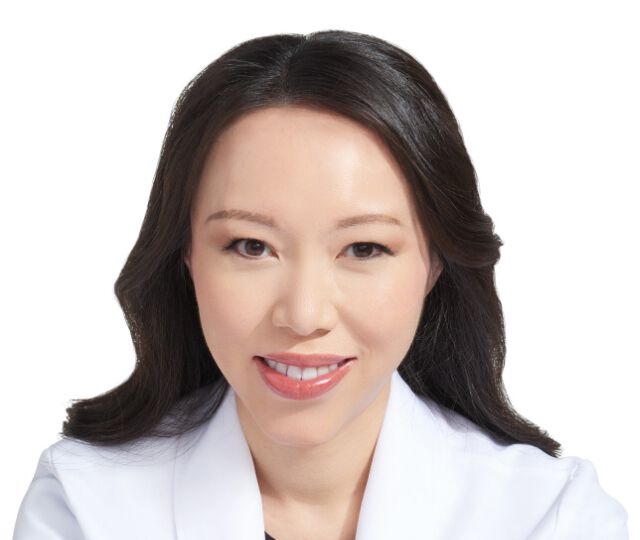A closely cropped headshot of IT Cosmetics advisor Dr. Julia Tzu's face.