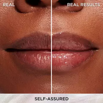 A close-up photo of a woman's lips with a white line down the middle of the image. The lips don't have any product on the left side of the line, and on the right side is IT Cosmetics Confidence in a Serum Lip Gloss in the shade "Self-Assured."
