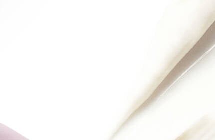 Banner image with pink background showing skincare product dropper