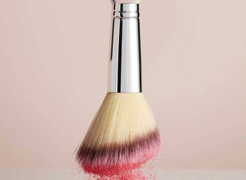A photo of a makeup brush