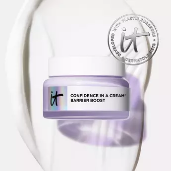 A photo of a jar of IT Cosmetics Confidence In A Cream Barrier Boost on a white background with a swipe of cream and an IT seal in the top right corner.