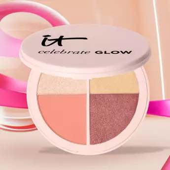 A photo of the IT Cosmetics "IT Celebrate Glow" palette standing on its side, with the top open so you can see the products inside.