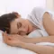 A woman lying on a bed