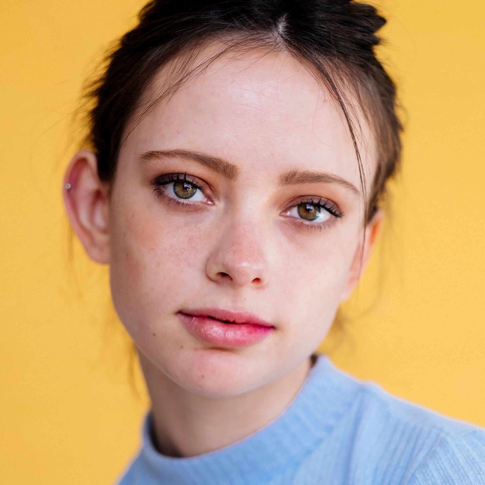 A close up photo of a woman's face
