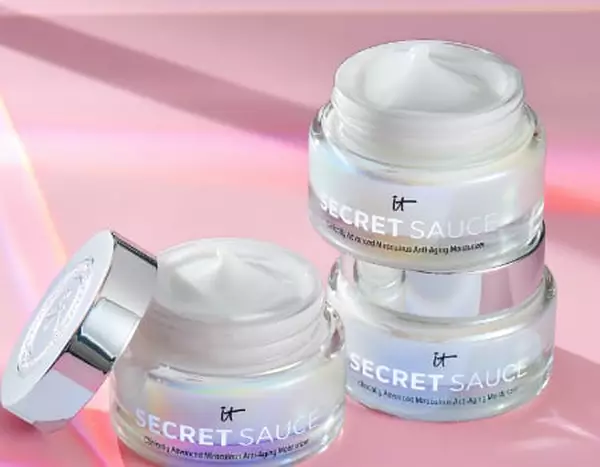 Cropped image of IT Cosmetics Secret Sauce Moisturizer with a pink background
