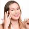 Woman with Blonde Hair Applyingi Eye Cream