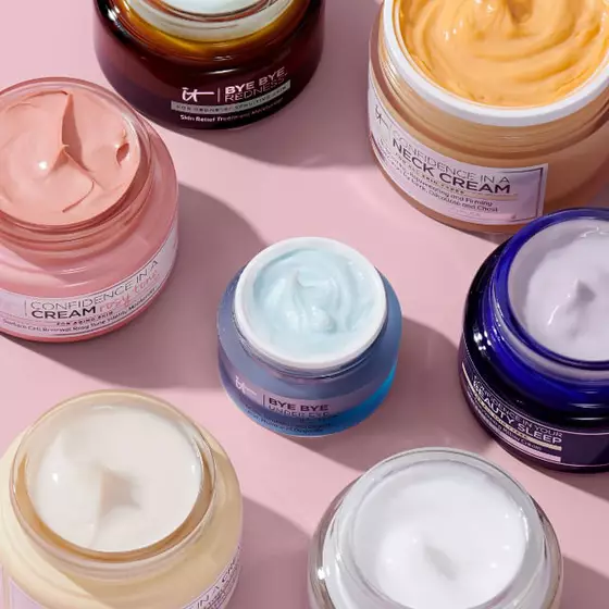 Arrangement of IT Cosmetics Bye Bye Redness, Confidence in a Neck Cream, Bye Bye Under Eye and other face creams